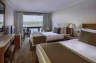 Stateroom aboard Iberotel Crown Emperor Nile Cruise with panoramic river view